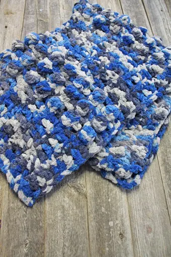 Try this quick and easy chenille crochet baby blanket pattern. There is a free printable PDF available.