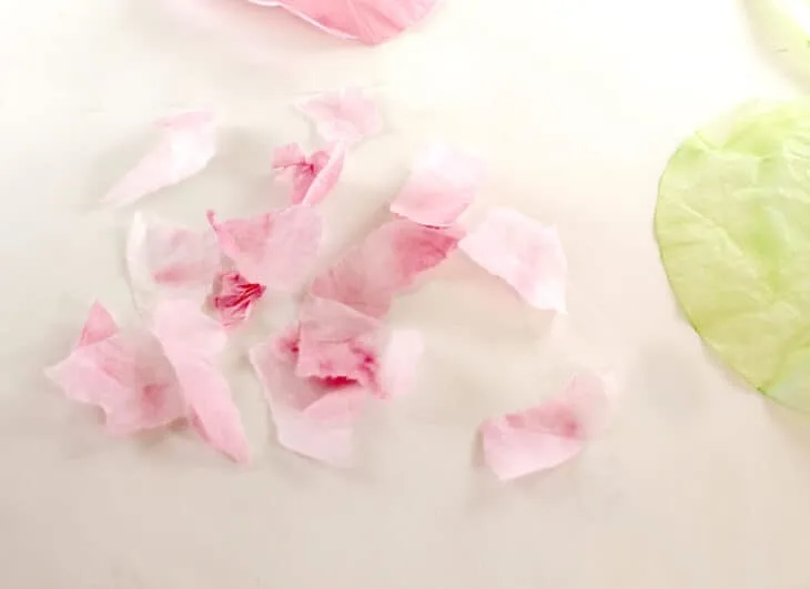 Pieces of the colored coffee filter to glue to the branches of the cherry tree.