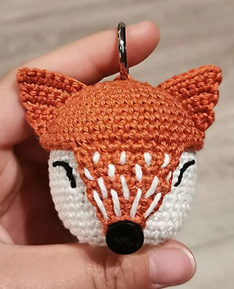 Make your own cute fox lip balm keychain with this free crochet pattern.