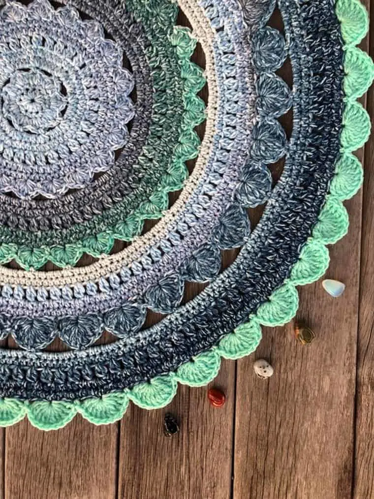 Make a mandala crochet rug with this free pattern.