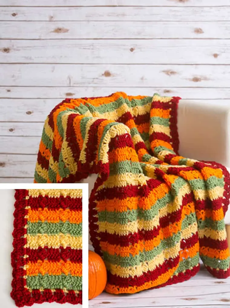 colorful striped fall throw in red, green, orange and yellow.
