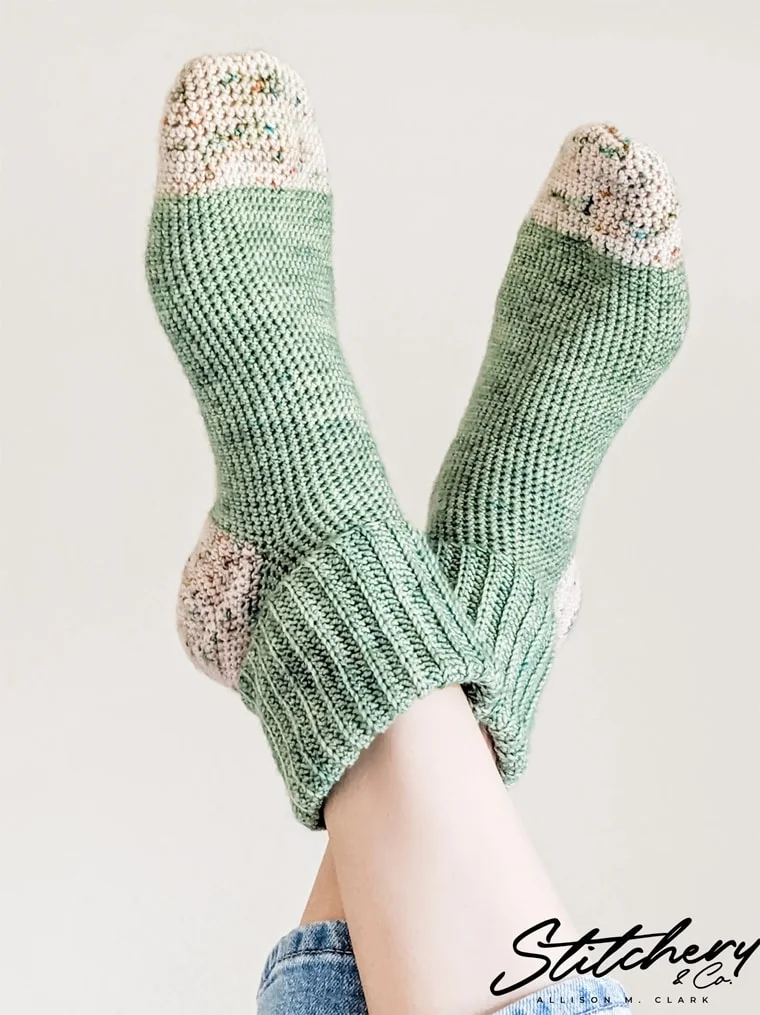 green and white cuffed crochet socks