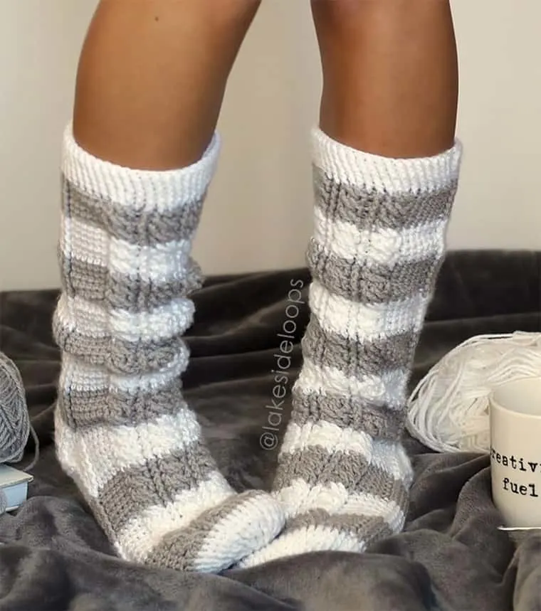striped gray and white crocheted cable socks