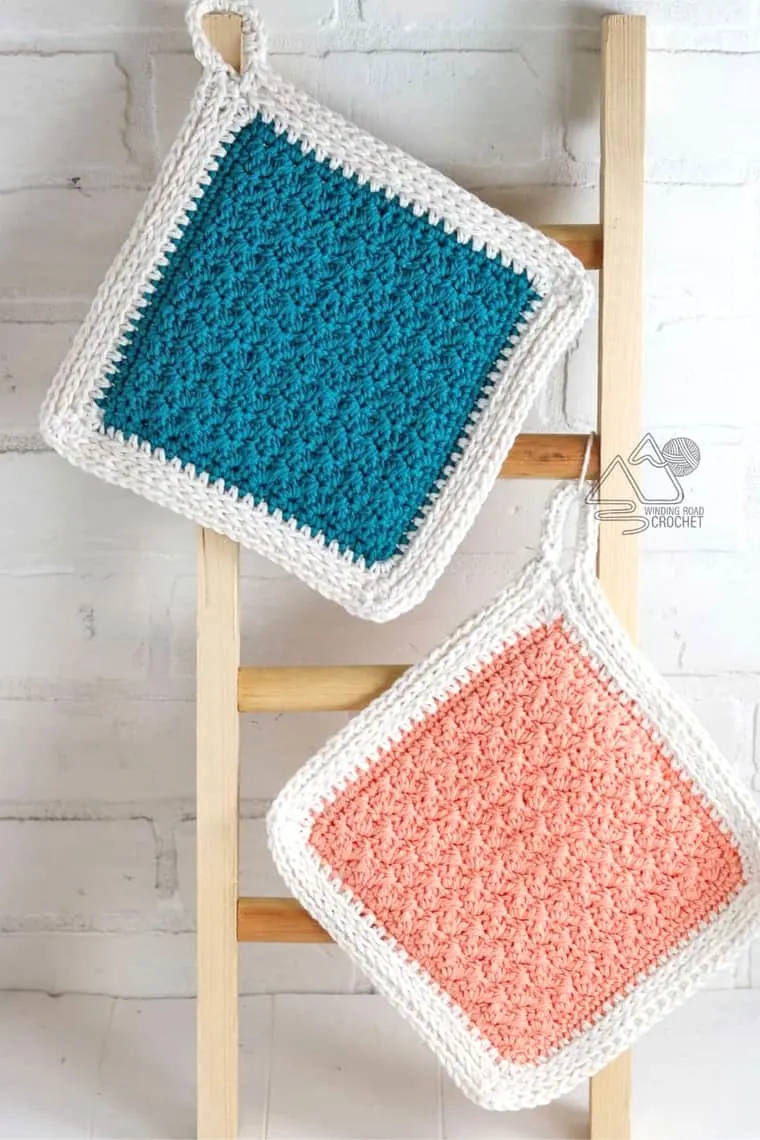 textured crocheted potholders with white border