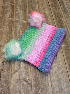 Try this easy sack hat crochet pattern. Make a rectangle and turn it into a hat.