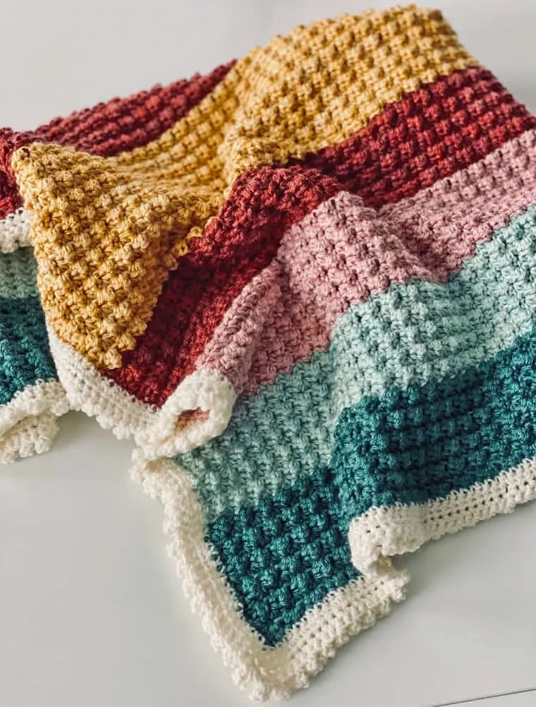 crocheted striped baby blanket