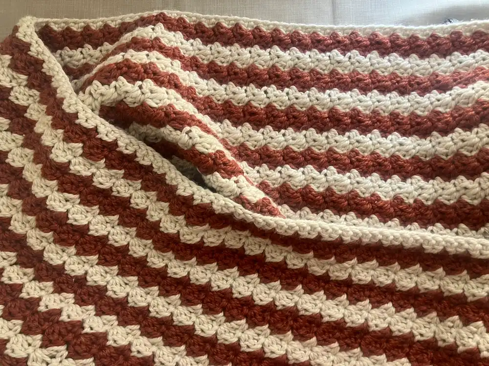 confetti blanket in Lion Brand thick and quick re-spun cinnamon and whipped cream; chain 114