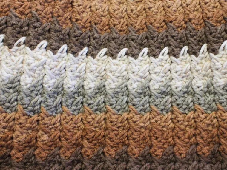 close up of coffee throw bulky yarn blanket using the spiked sedge stitch