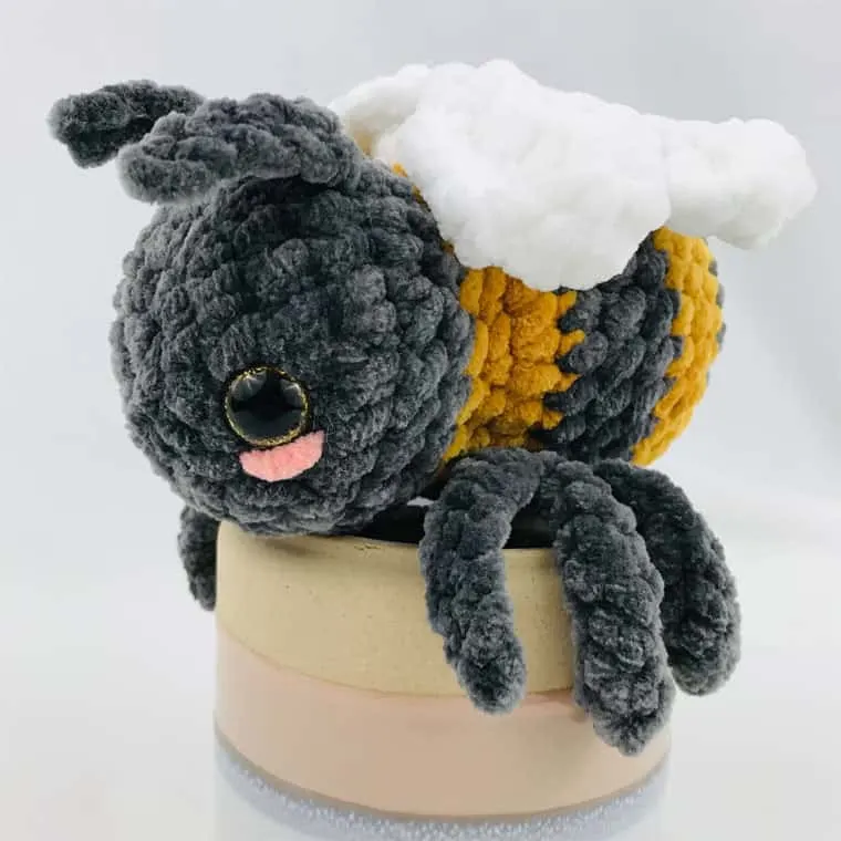 crocheted busy bee stuffed toy