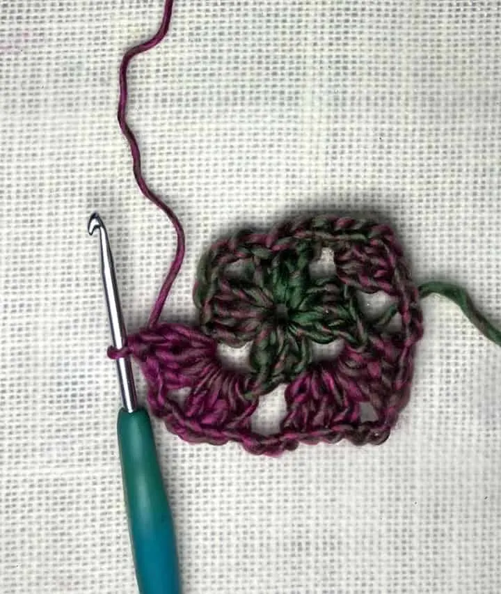 crocheted granny square in Red Heart Unforgettable Yarn in Stain Glass chain 3