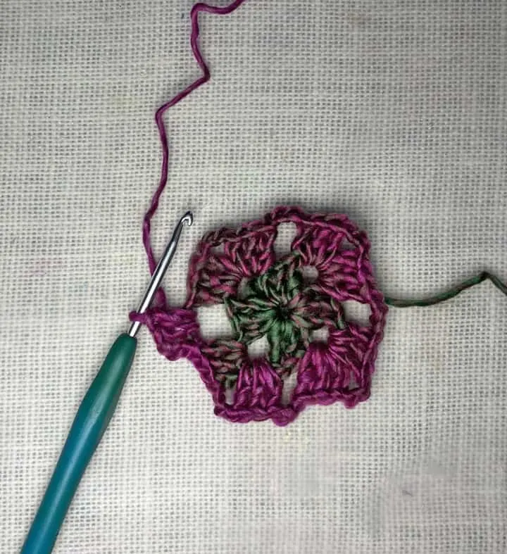 crocheted granny square in Red Heart Unforgettable Yarn in Stain Glass chain 3