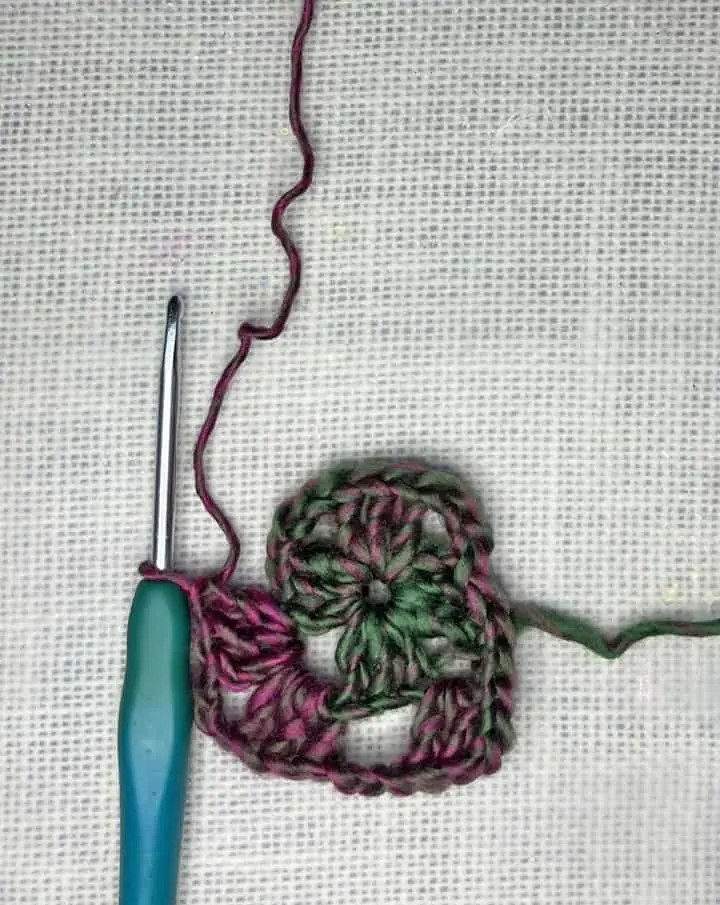 crocheted granny square in Red Heart Unforgettable Yarn in Stain Glass chain 3