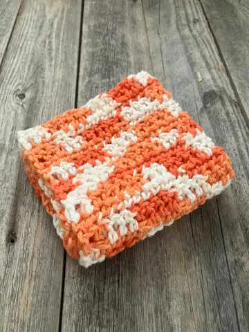 orange white crocheted brick stitch cotton washcloth