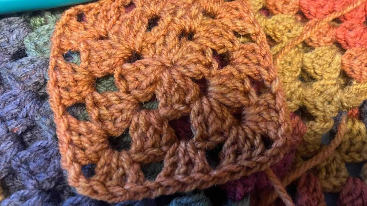 Easy Amore Kaleidoscope Granny Square Crochet Blanket Pattern colorful granny square